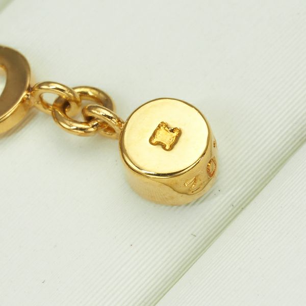 セリーヌ ピアス ダイヤ 0.02ct/0.02ct Cロゴ 揺れる K18YG 