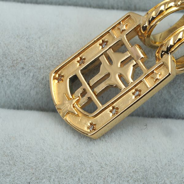 SJX ペンダントトップ ダイヤ 0.12ct  タグ フレーム S クロス K18YG 