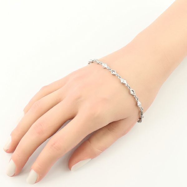 ローリーロドキン ブレスレット   クロスオープン チェーン K18WG 